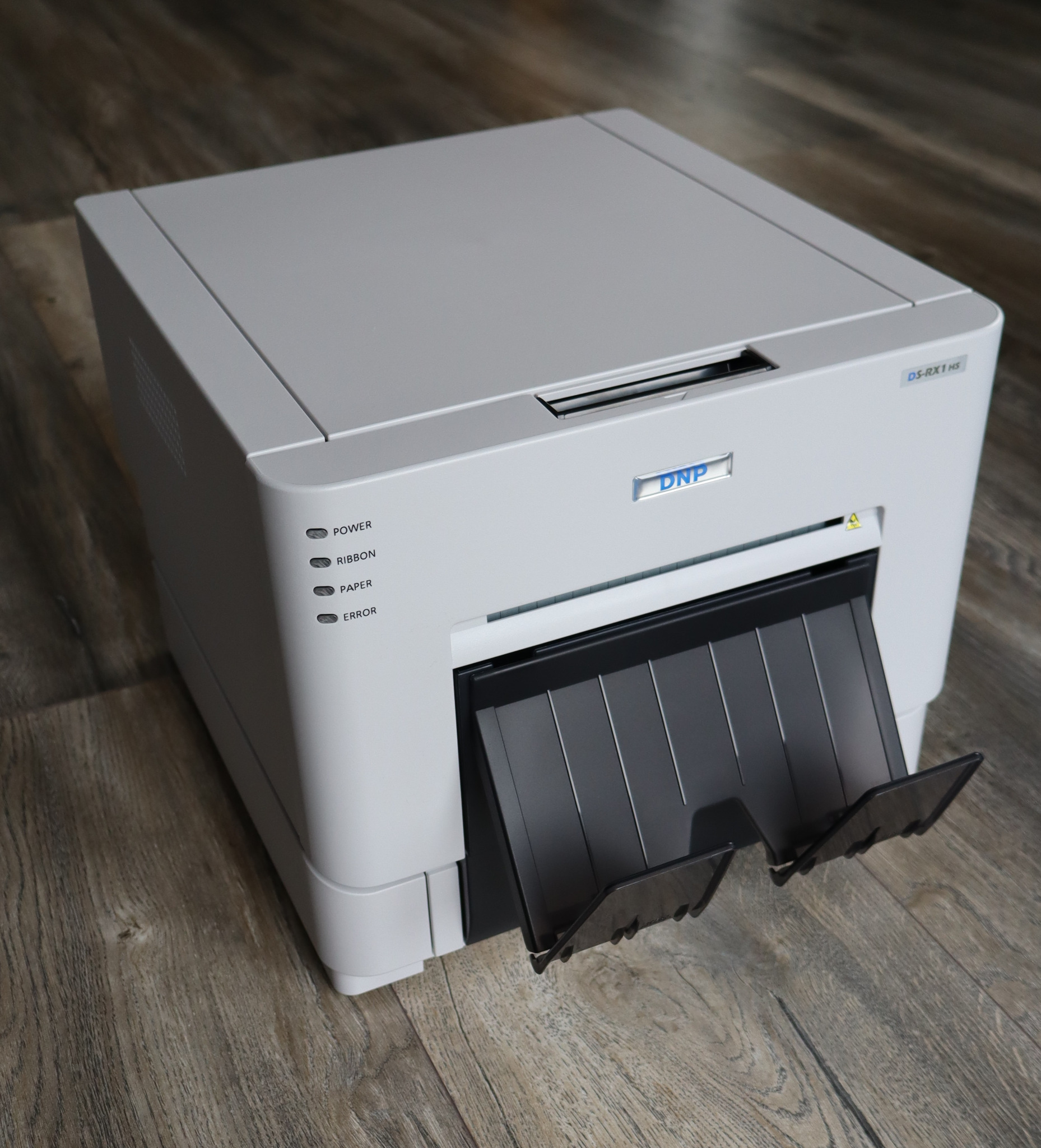 Professioneller Fotodrucker für die HappyFlash Fotobox